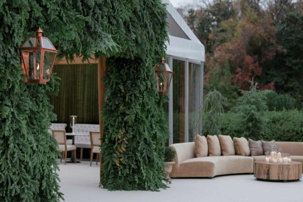 A modular sofa styled for a winter wedding