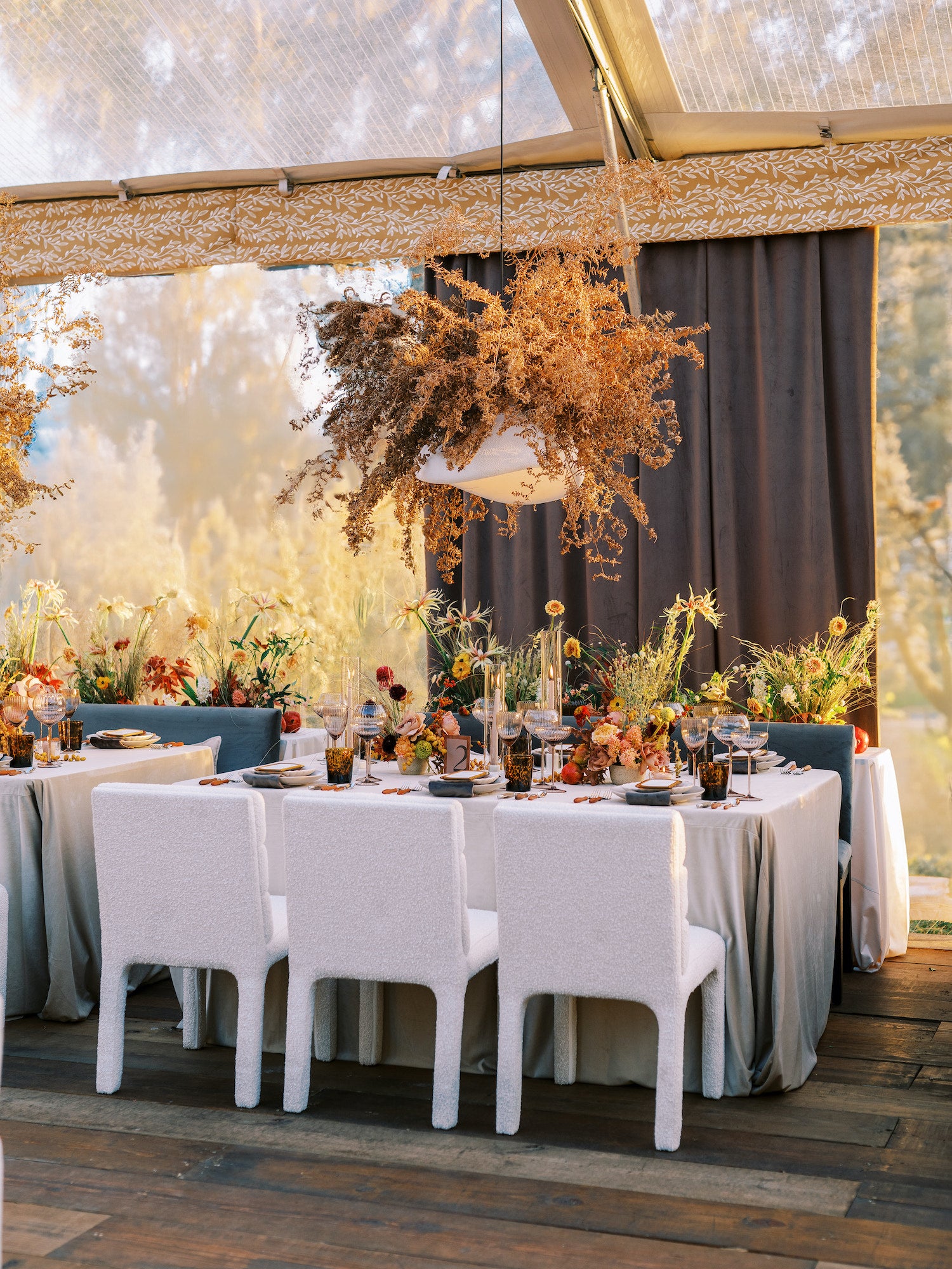 Refined wedding tablescape with warm neutrals, ceramic dinnerware, and custom event rentals in South Carolina